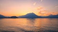 Sunset behind Alps mountains and Como lake, Italy. Royalty Free Stock Photo