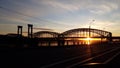 sunset behind the bridge Royalty Free Stock Photo