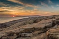 Sunset behind Cadillac Mountain Acadia National Park as seen from Schoodic Point Royalty Free Stock Photo