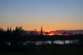 Sunset behind the church towers of Luebeck, northern Germany, pa Royalty Free Stock Photo