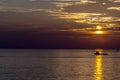 Sunset behind cloud in ocean Royalty Free Stock Photo
