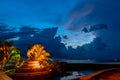 Sunset behind the great Naga statue in Karon beach Royalty Free Stock Photo