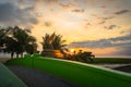 sunset behind the great Naga statue in Karon beach Royalty Free Stock Photo