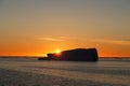 Sunset behind iceberg Royalty Free Stock Photo