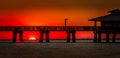 Sunset behind the pier of Fort Myers Beach, Florida Royalty Free Stock Photo