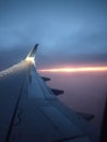 Sunset behind a plane wing 002 Royalty Free Stock Photo