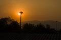 Sunset behind the sky, orange sky, unset at city of Chiangmai with building silhouette