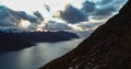 Sunset behind a snowy mountain range Royalty Free Stock Photo