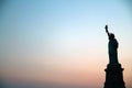 Liberty statue sunset in New York Royalty Free Stock Photo