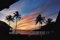 Sunset behind tropical beach silhouette summer fun