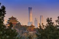 Sunset Beijing cityscape between ancient chinese architecture. historic buildings and Beijing modern building with sweet sun rise