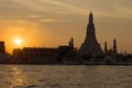 Sunset at the Big Prang of the Buddhist temple Wat Arun. Bangkok, Thailand Royalty Free Stock Photo