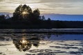 Sunset on forest river in Belarus. Canoe travel.