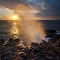 Sunset and blowhole Royalty Free Stock Photo
