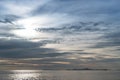 Sunset with blue fluffy cloudy sky and sea overlooking the island, Beautiful dramatic cloudscape, Cloudy sky background Royalty Free Stock Photo