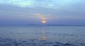 Sunset on blue sea