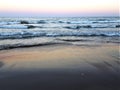 Sunset blue sea waves beach Royalty Free Stock Photo