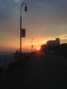 Sunset on Boardwalk on Long Beach.