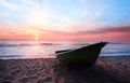 Sunset.Boat on coast. Royalty Free Stock Photo