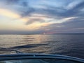 sunset on the boat open water Royalty Free Stock Photo