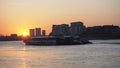 Sunset and boat on River Thames seen from Greenwich Pier Royalty Free Stock Photo