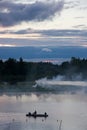 Sunset, boat and smoke Royalty Free Stock Photo