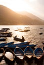 Sunset with boats at Fewa lake