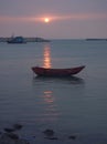 Sunset and Boats on Seashore Royalty Free Stock Photo