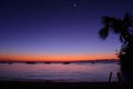 Sunset on Boracay island. Sailing and other traditional boats with tourists on the sea against the background of the Royalty Free Stock Photo