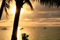 Sunset on Boracay island. Sailing and other traditional boats with tourists on the sea against the background of the Royalty Free Stock Photo