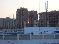 Sunset between buildings on the beach