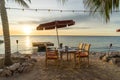 Sunset and cafe by the sea Royalty Free Stock Photo