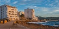 Sunset on the Cafes on Ibiza beaches. Golden glow as the sun goes down in St Antoni de Portmany Balearic Islands, Spain Royalty Free Stock Photo