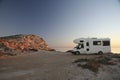 Sunset with camper at ocean shore 8 Royalty Free Stock Photo