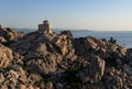 Sunset at the Capotesta Lighthouse in Sardinia Royalty Free Stock Photo