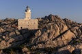 Sunset at the Capotesta Lighthouse in Sardinia Royalty Free Stock Photo