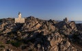 Sunset at the Capotesta Lighthouse in Sardinia Royalty Free Stock Photo