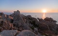 Sunset at the Capotesta Lighthouse in Sardinia Royalty Free Stock Photo