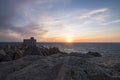 Sunset at the Capotesta lighthouse in Sardinia Royalty Free Stock Photo