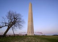 Sunset captured behind the circle of flags at the Washington Monument Royalty Free Stock Photo