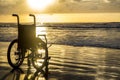 Sunset childlike wheelchair horizon sand