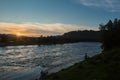 Sunset on a choppy river wind early spring landscape Royalty Free Stock Photo