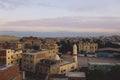 Sunset Cityscape View to the Giza City with the Colorful Sky and Local Buildings