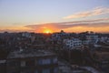 Sunset Cityscape View to the Giza City with the Colorful Sky and Local Buildings