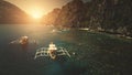 Sunset at closeup passenger boats at cliff ocean shore aerial. Tourists swim, dive at sea bay water