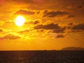 Sunset and cloud gold color over sea in evening