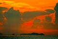 sunset cloud on silhouette sky fishing boat on sea and island