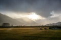 Sunset and irradiated meadow in the Austrian mountains Royalty Free Stock Photo