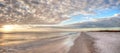 Sunset and clouds over the calm water of Tigertail Beach on Marco Island Royalty Free Stock Photo