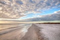 Sunset and clouds over the calm water of Tigertail Beach on Marco Island Royalty Free Stock Photo